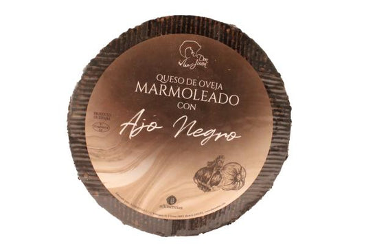 Brebis à l'Ail Noir – Don Juan Queso de Oveja Marmoleado con Ajo Negro – spanischer Schafskäse mit schwarzem Knoblauch von Alimentias, ganze Meule mit dunkler Naturrinde